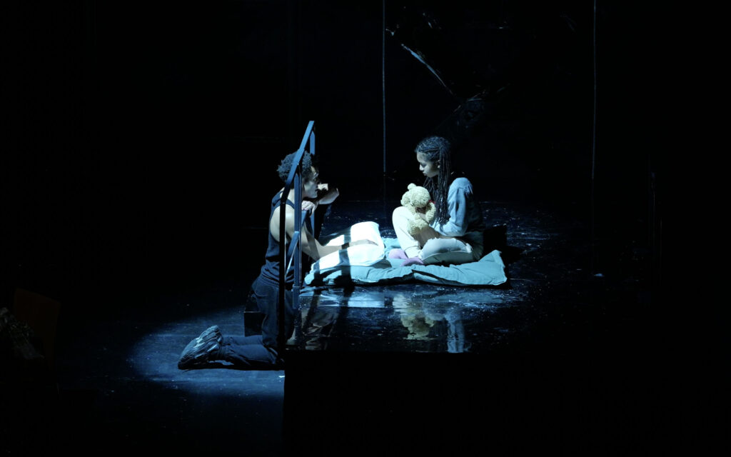 A dramatic WITNESS scene under a spotlight
