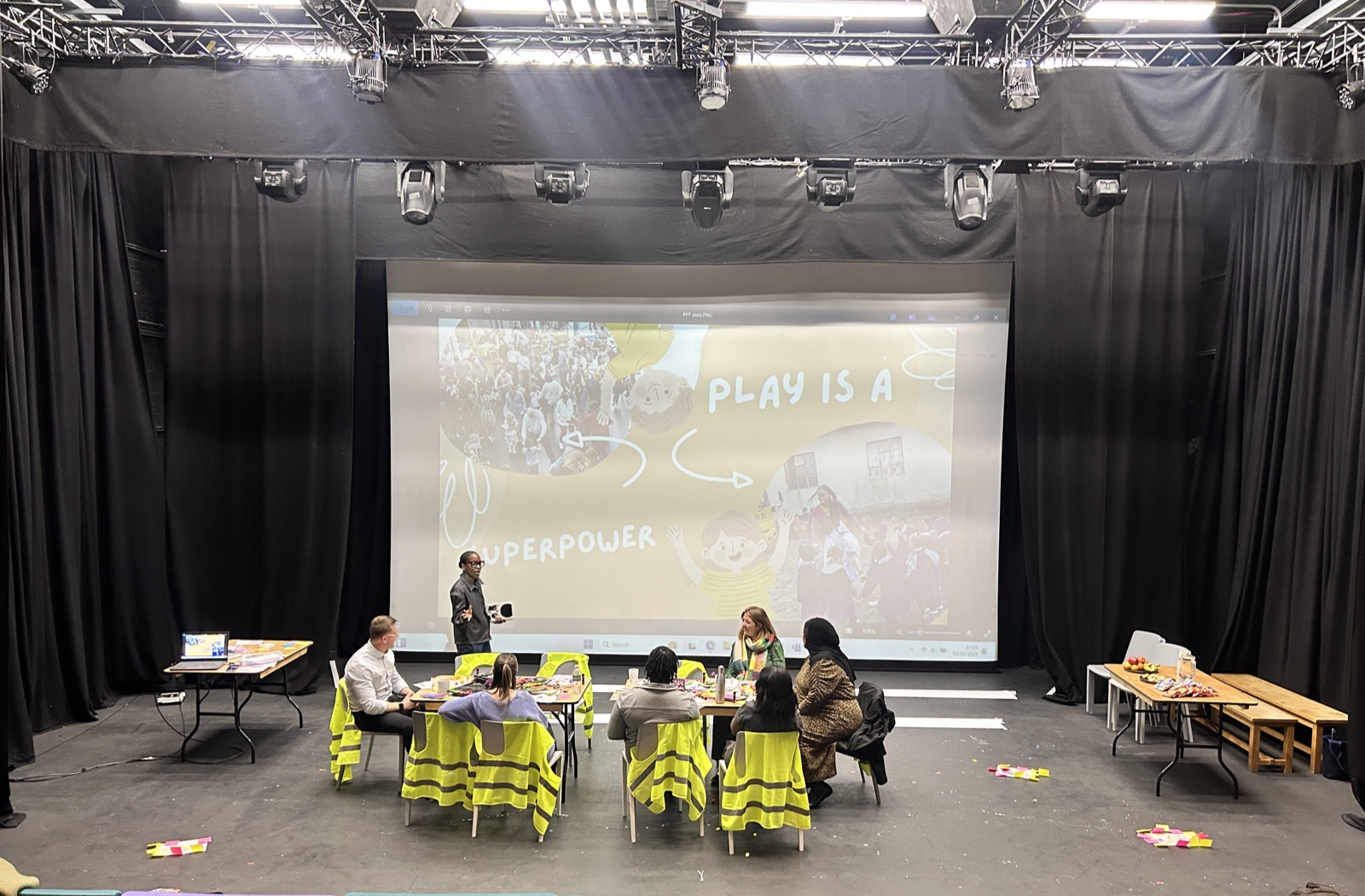 Participants exploring creative play in a theatre workshop